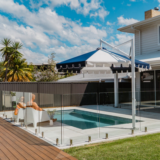Modern house with a pool and deck area on a sunny day